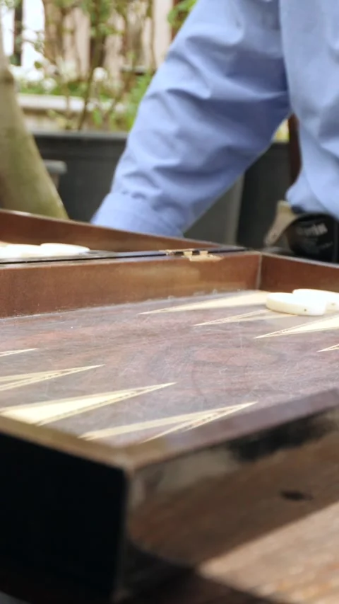 Hands of men playing backgammon Stock Footage 332875903