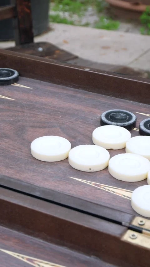 Hands of men playing backgammon Stock Footage 332875976