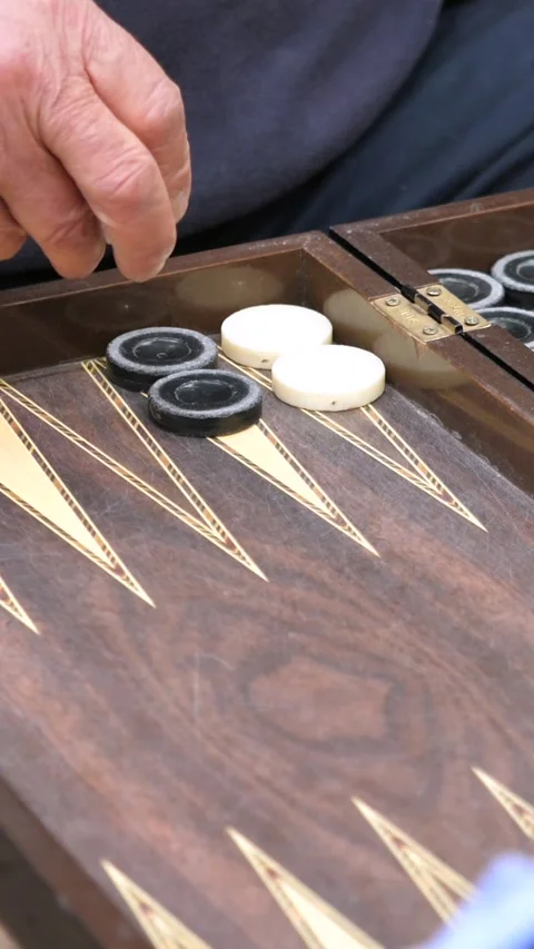 Hands of men playing backgammon Stock Footage 332876133