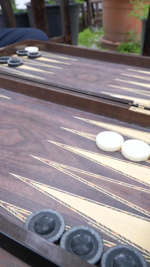 Hands of men playing backgammon Stock Footage 332876188