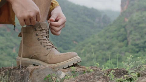 Hands of men tying shoe laces Stock Footage 170102369
