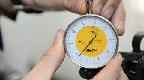 Hands with micrometer Stock Footage 61749668