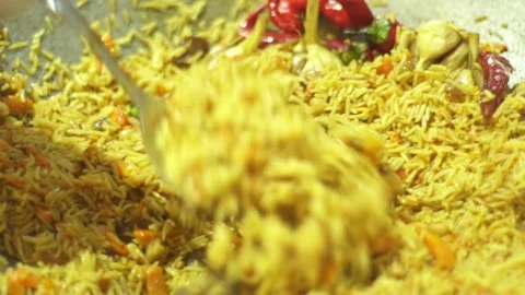 Hands mix pilaf Stock Footage 86510842