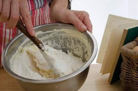 Hands mixing a cake Stock Photos