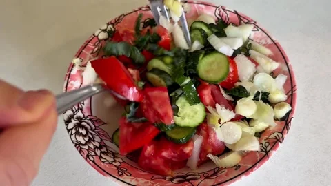 Hands Mixing Fresh Tomato, Cucumber and Kale Salad Stock Footage 344577499