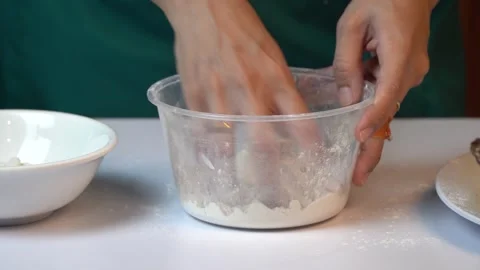 Hands Mixing Raw Shrimp with Flour in a Bowl 스톡 동영상 334322458