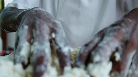 HANDS MIXING WHEAT FLOUR Stock Footage 161401854