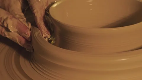 Hands mold a vase of clay Stock Footage 252889526