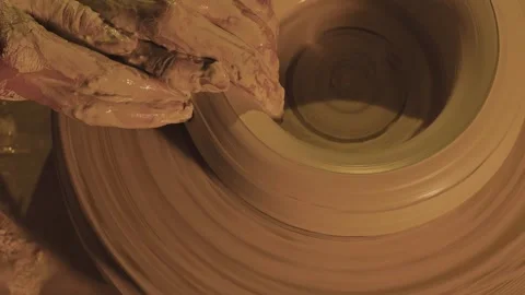 Hands mold a vase of clay Stock Footage 252895138