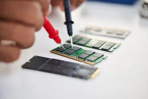 Hands, motherboard and engineer solder circuit board for technology, electrical Stock Photos
