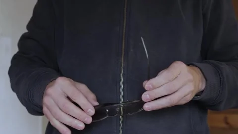 Hands move the frames of glasses Stock Footage 342866340