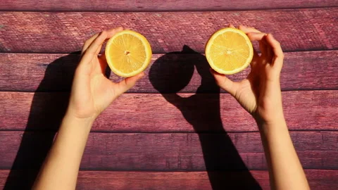 Hands move yellow Lemon, tropical citrus fruit as healthy food Stock Footage 101231937