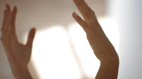 Hands moving up in the air dancing 库存影片 114383350