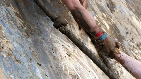 Hands mudrun Stock Photos