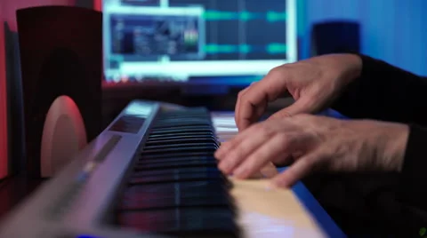 Hands of Musician Playing Keyboard in Dark Studio Stock Footage 59449011