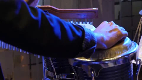 Hands of a musician playing percussion Stock Footage 168606563