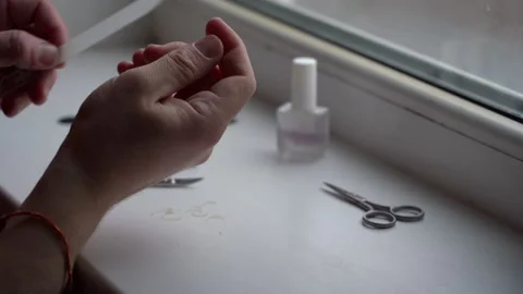 Hands, nail file close-up. Manicure, wellness and cosmetics with a man. Stock Footage 256285405