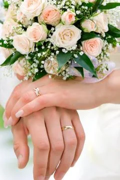 Hands of new married Stock Photos