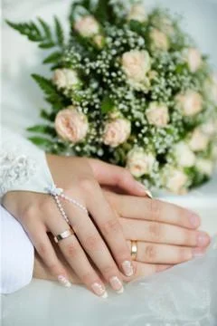 Hands of new married Stock Photos