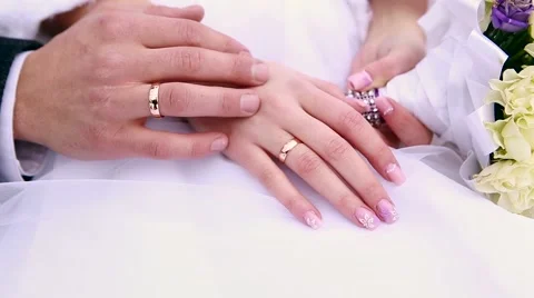 Hands of newlyweds with wedding rings wedding Stock Footage 59174076