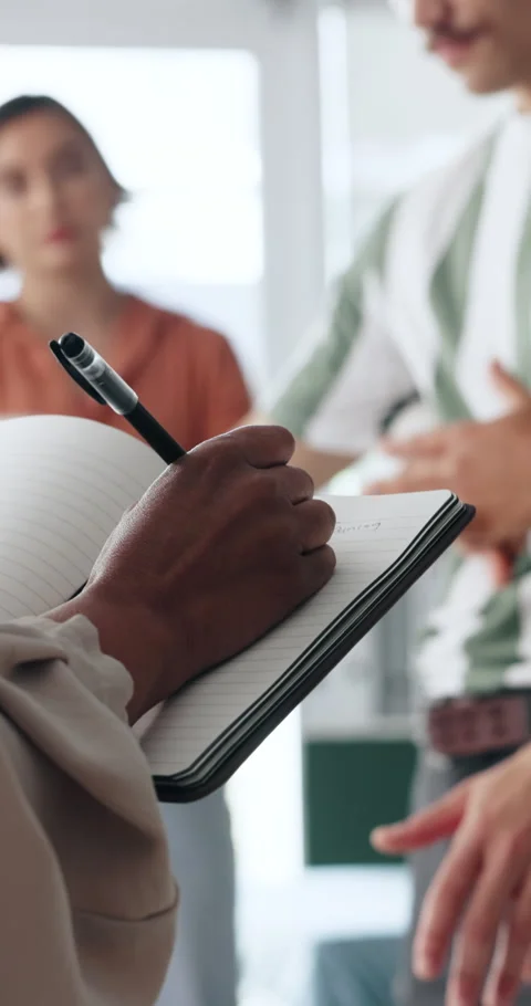 Hands, notebook and writing with training for first aid, teaching and staff Stock Footage 332968169