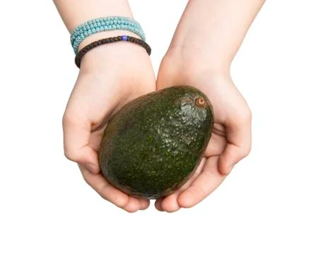 Hands Offering an Avocado Foto stock
