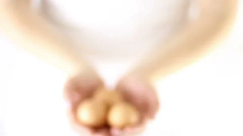 Hands Offering fresh eggs Stock Footage 34865784