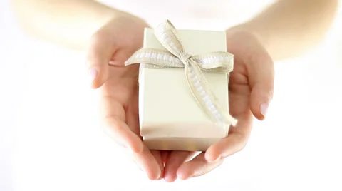 Hands Offering a gift Stock Footage 34865714