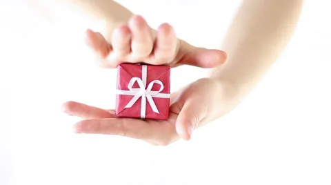 Hands Offering a gift Stock Footage 34866000