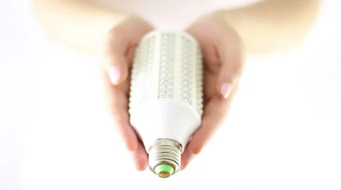 Hands Offering led new type bulb Stock Footage 34865680