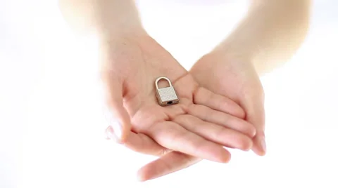 Hands Offering a miniature lock Stock Footage 34866005