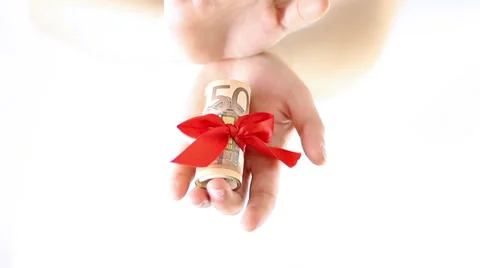 Hands Offering money gift with red Ribbon Stock Footage 34866049