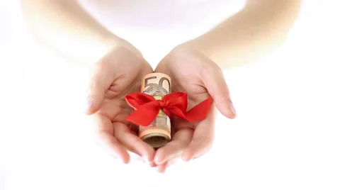 Hands Offering money gift with red Ribbon Stock Footage 34866056