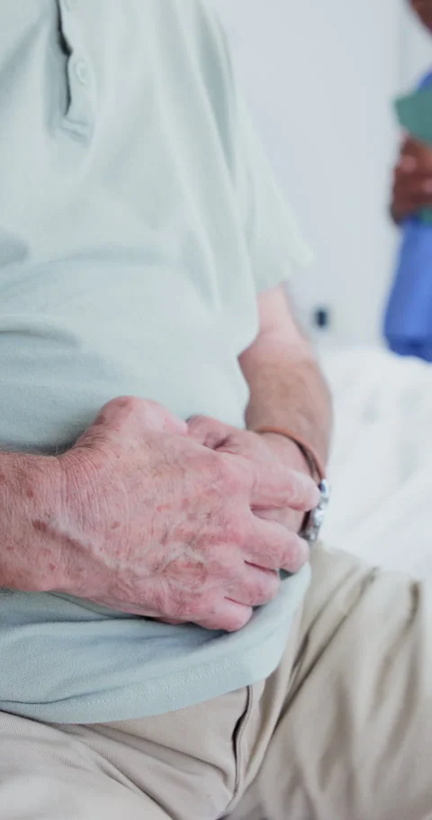 Hands, old man and visitor waiting at hospital, consultation and nervous for Stock Footage 340881415