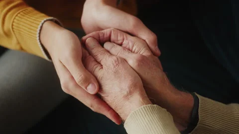 Hands of the old man and a young man. Grandfather and grandson Stock-Footage 221570692