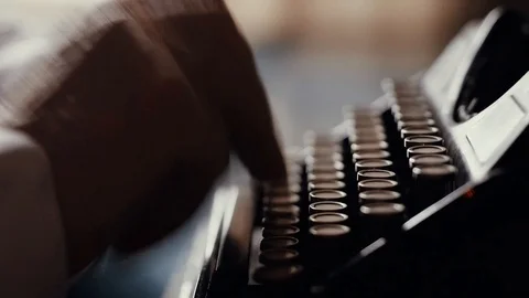 The hands of an old man are typing on an old typewriter, a writer's antique Stock Footage 99053589