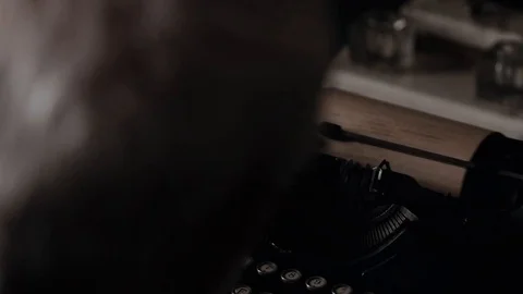 The hands of an old man are typing on an old typewriter, a writer's antique Stock Footage 99053602