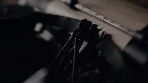 The hands of an old man are typing on an old typewriter, a writer's antique Stock Footage 99053684