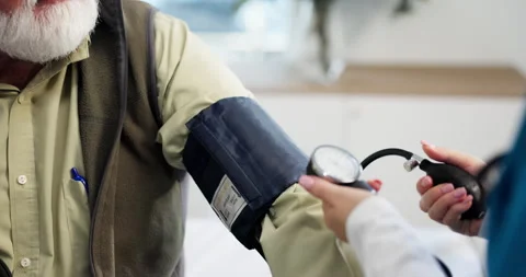 Hands, old man or nurse with blood pressure in clinic for healthcare checkup Stock-Footage 310662256
