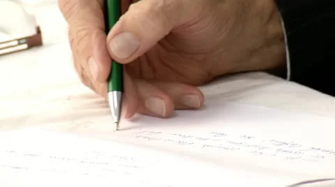 Hands of old man writing letter Stock Footage 14482231