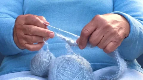 The hands of an old woman at needlework Stock Footage 262768237