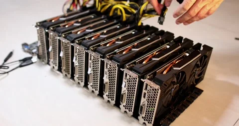 Hands one by one take out wires and video cards from the motherboard. 4K video Stock Footage 156040502