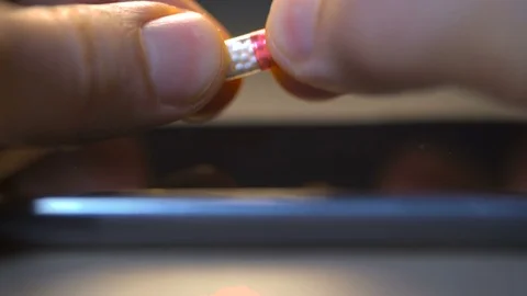 Hands open and poured the pills contains white balls Stock Footage 71749043