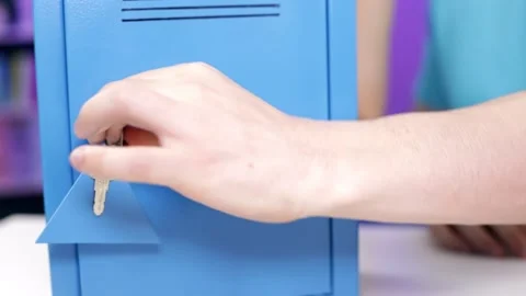 Hands open a blue safe with a onion Stock Footage 166552835