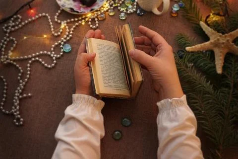 The hands open the book Stock Photos