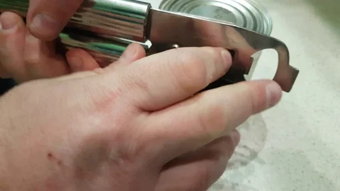 Hands open canned tools Video stock 86307274