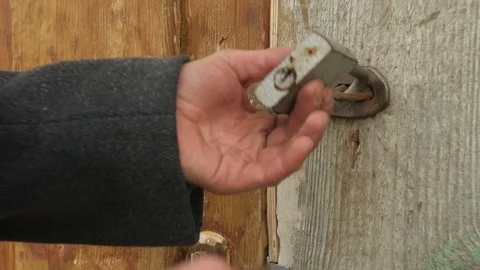The hands open the padlock Stock-Footage 80823708