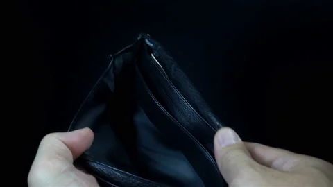 Hands open a wallet with a one dollar in 4K Video stock 146665382