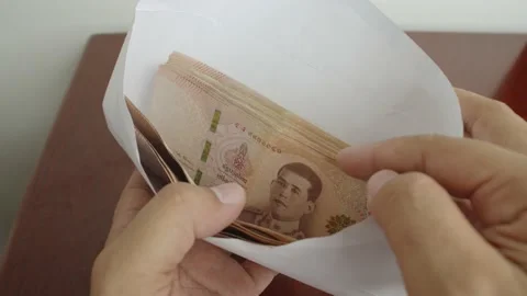 Hands open white envelope and counting cash money. Stock Footage 237509483