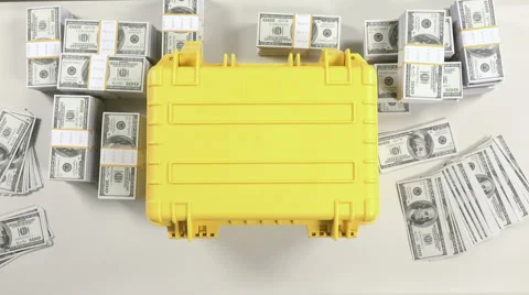 Hands open yellow suitcase and put into cash money. Video stock 61827522